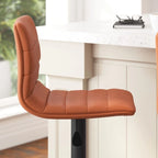 Tabouret de bar pivotant à hauteur réglable avec surpiqûres horizontales et repose-pieds, cognac / noir / gris, structure noire